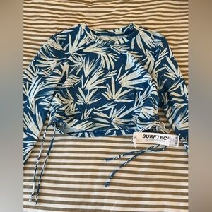 JOLYN Kylie Rash Guard Blue & White Tropical Print Top - Surftec